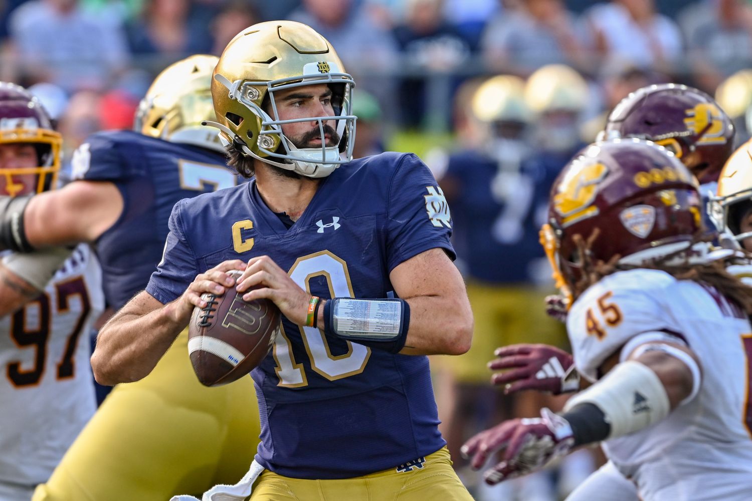 Notre Dame Fighting Irish quarterback Sam Hartman throws the ball against the Central Michigan Chippewas.